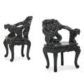 Pair of japanese armchairs ebonized hardwood with carved vernacular design early 20th c 34 x 25 x 22