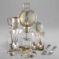 Silver utensils cups and mirrors six hibernia silver spoons by m west and sons dublin 18251826 three coin silver spoons with incised handles three english sugar tongs two wm briggs small sau