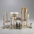 Weighted sterling holloware and candlesticks fourteen pieces pierced center bowl 4 34 x 9 14 two trumpet vases 9 14 and 8 34 two pairs candlesticks 7 14 and 8 12 two pairs salt and