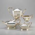 Gorham fairfax silver coffee service four pieces tapered octagonal form octagonal finials and resinous insulators with associated oval international silver apple tray with sinuous organic handl