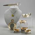 Eight pieces of buccellati sterling tastevin 4 14 shell handled tastevin 4 38 letter slice with magnifier 7 34 enameled peach pendant two pairs footed dishes with gadroon rims 3 14 an