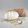 Two judith leiber snakeskin clutches white with 24 varied cabochon hardstones on frame and push release closure gold tone hardware and attached chain white satin interior original accessories incl