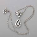 Diamond 14k white gold pendaloque necklace fine pear shaped round marquise and baguette cut diamonds 215 cts tw throughout in articulated setting 1 14 chain 16 38 dwt
