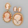 14k yellow gold mounted carved shell cameos five pieces two pendants one wearing necklace with diamond 04 ct ring size 5 14 postback earrings for pierced ears mid 20th c largest 1 58