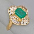 Emerald and diamond 14k yellow gold ring rectangular step cut emerald 140 cts by formula baguette and circular cut diamonds approx 1 cts tw ca 1990 size 7 38 dwt