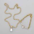 Cultured pearl and diamond necklace and bracelet 18k yg surmount set with diamonds approx 15 cts tw above teardrop shaped pearl approx 11 mm with detachable bail on 14k yg chain 18 18k