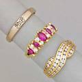 Three 14k gold rings with diamonds channel set 14k yg band ruby and diamond pyramid 14k yg cocktail ring white gold band diamonds approx 1 cts tw sizes 5 12  7 12 55 dwt