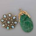Gold jewelry with diamonds and gems two pieces 14k gold opal and diamond scroll brooch 1 12 carved nephrite tablet in leafy diamond set 14k gold pendant 2 18 20th c 177 dwt gw
