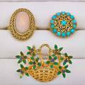 Group of 18k yellow gold jewelry three pieces bezel set and basket woven angel skin coral ring italy size 9 12 turquoise filigree ring italy size 8 12 green enamel giardinetto brooch set wit