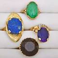 Four gold gem set rings mid 20th century 14k yg ring with amethyst and wg topped diamonds size 5 12 14k yg ovular design ring with flat lapis stone size 7 14k yg ring with large smokey quar