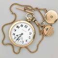 Hamilton railroad grade pocket watch 1919 open face with gold plated case no 992 21 jewels 5 position adjustments screw back gold filled chain and locket fobs 50 mm