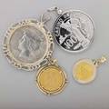 Assorted gold or silver coin jewelry and token four pieces 1912 queen wilhelmina 10 gulden and gold pendant bicolor chinese 10 yuan panda coin pendant 1922 american peace dollar in silver pendant