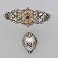 Indian baroque style bracelet and ring hinged bracelet with rose cut diamonds and sapphires scrolling foliate motif silver topped 10k and 14k gold surmount accommodates 6 12 blister pearl ring