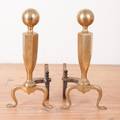 A Pair of Ball Top Andirons