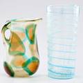 Barovier style pitcher decorated with encased gold flecks and vase with externally applied grid decoration 20th c both unmarked taller 12 12
