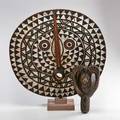 Burkina faso masks two in carved wood mid 20th c bwa sun mask and a bwa horned mask taller 30