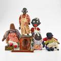 African american group nine pieces including four dolls tin toysnoisemakers etc 20th c longest 14