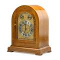 Waterbury shelf clock tambour style with mahogany case westminster chime eight day movement early 20th c 16 x 13 x 8
