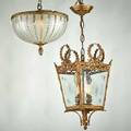 Ceiling fixtures two brass and glass one with a frosted domed shade the other a four panel lantern taller 16 12