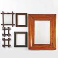 Tramp art four picture frames of various size together with two ogee mirrors first quarter 20th c painted wood mirrored glass all unmarked largest 29 18 x 21 12