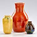 Ruskin three iridescent vases two with floral decoration smethwick england first quarter 20th c all marked tallest 10 