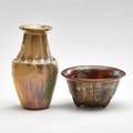 Pewabic small vase in iridescent gold glaze and footed bowl in iridescent gold and oxblood glazes detroit mi both marked taller 5