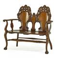 Golden oak carved back settee quarter sawn oak with plank seat on ball and claw feet early 20th c 42 x 47 x 20