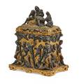Continental gilt and patinated bronze box the lid with man and woman resisting a devil the body with dancing devils serpents and other creatures 19th c 8 x 6 12 x 4 12