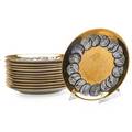 Piero fornasetti 1913  1988 twelve porcelain transferdecorated salad plates with roman coin design italy des 195060 all marked fornasetti milano made in italy with green porzellanfabrik arzb