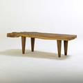 Studio free edge and sculpted teak coffee table 1990s 18 x 60 x 32