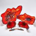 Style of chihuly nine red mottled glass pieces usa 2005 six illegibly signed with date largest 14 12 x 24 x12
