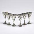 Sheffield pewter set of six flaring cordials in the style of desny on cone shaped buttressed bases decorated with female figures stamped manor period with trademarktwco ltdsheffield pewter2