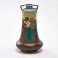 Weller dickensware ii twohandled vase depicting woman golfing zanesville oh 19001905 stamped dickenswareweller 7 x 3 34 dia