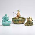 Weller three flower frogs muskota fog figure and boy fishing with low bowl hobart boy with swan zanesville oh 1915late 1920s hobart illegibly marked low bowl 7 34 dia
