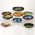 Fulper nine low bowls flemington nj ca 19101928 including three tensided two with greek key design etc glazed earthenware all marked largest 11 dia