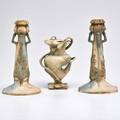 Imperial riessner  kessel amphora pair of candlesticks decorated with poppy seed pods and small vase with square foot turnteplitz bohemia ca 1900 one candlestick and vase legibly marked can
