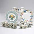 Villeroy and boch twenty four pieces germany second half 20th c set of seven dinner plates and five mugs in melina pattern set of five dinner plates three mugs creamer and sugar in basket patt