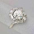 Art deco diamond and platinum ring fine transitional cut diamond approx 225 cts geometrically framed among trapezoid baguette and kite cut diamonds approx 160 cts ca 1943 size 6 12 25
