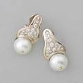 Ruven perelman south sea pearl and diamond earrings 18k gold globular surmounts support post set drilled white south sea cultured pearls 123  121 mm 26 bead set diamonds approx 130 cts tw