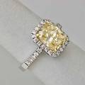 302 cts fancy color diamond ring gia report 2155220364 describes natural fancy brownish yellow diamond weighing 302 cts modified cushion cut si2 good polish good symmetry strong blue fluore