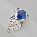 Sapphire and diamond platinum ring ceylon sapphire 154 cts open work mount with sapphire channels and diamond accents ca 1935 size 6 12 29 dwt
