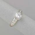 Diamond engagement ring transitional cut diamond approx 90 ct flanked by six modern brilliant cut diamonds approx 28 ct tw 14k wg ca 1948 size 6 17 dwt