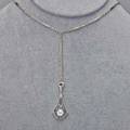 Art deco diamond filigree necklace pierced kiteshaped platinum pendant with oec diamond approx 50 ct in hexagonal setting on 14k wg fetter link lorgnette chain ca 1925 chain 24 drops 2 5