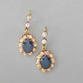 Sapphire and diamond gold drop earrings oval faceted blue sapphires framed by omc diamonds drop from hinged diamond surmounts two sapphires approx 600 cts tw 24 diamonds approx 200 cts tw