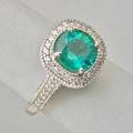 Emerald and diamond 14k white gold ring round brilliant cut emerald approx 35 cts cushionshaped raised halo setting with micro pave diamond edges gallery and shoulders approx 116 cts tw s