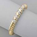 Diamond14k gold hinged bracelet designed as twisted rope centrally banded by circular cut diamonds approx 310 cts tw ca 1965 interior 2 38 x 2 28 dwt