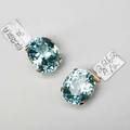 Pair of faceted oval cut aquamarines 2583 cts and 2575 cts by formula in 14k gold pendant mounts ca 1944 originally worn as earrings 107 dwt provenance the estate of constance moore 1920