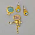 Ross coppelman gold cabochon sculptural jewelry brooch ring and pair of earrings of fused and textured 22k 18k and 14k gold set with aquamarines or rose quartz some diamond and pearl accents 198