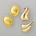 Designer gold earrings elizabeth locke bloomed and beaten 18k gold oval disks with shot decorated edge 1 116 transformable clips minas biomorphic 14k yg ear clips late 20th c 1 38 269 dwt