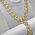 Bicolor 18k gold necklace and bracelet substantial 78 wide yellow gold links with white gold straps ca 1985 necklace 17 12 bracelet 8 14 959 dwt